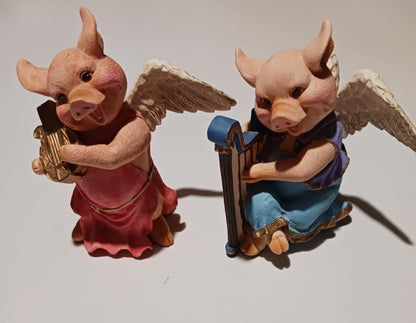 Angel pigs playing instruments