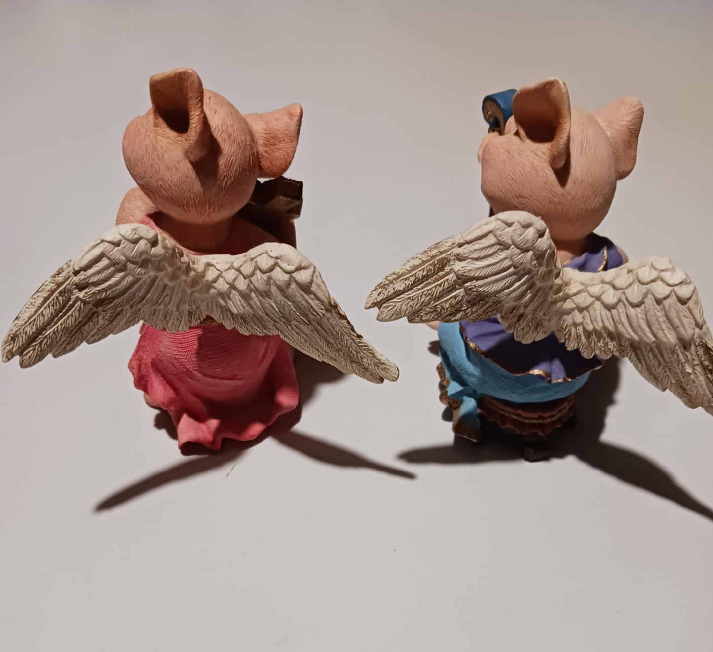 Angel pigs playing instruments