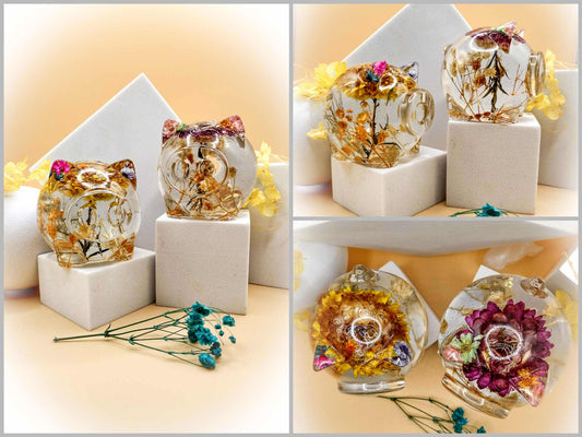 Pair of clear resin acrylic pigs (with flowers inside)