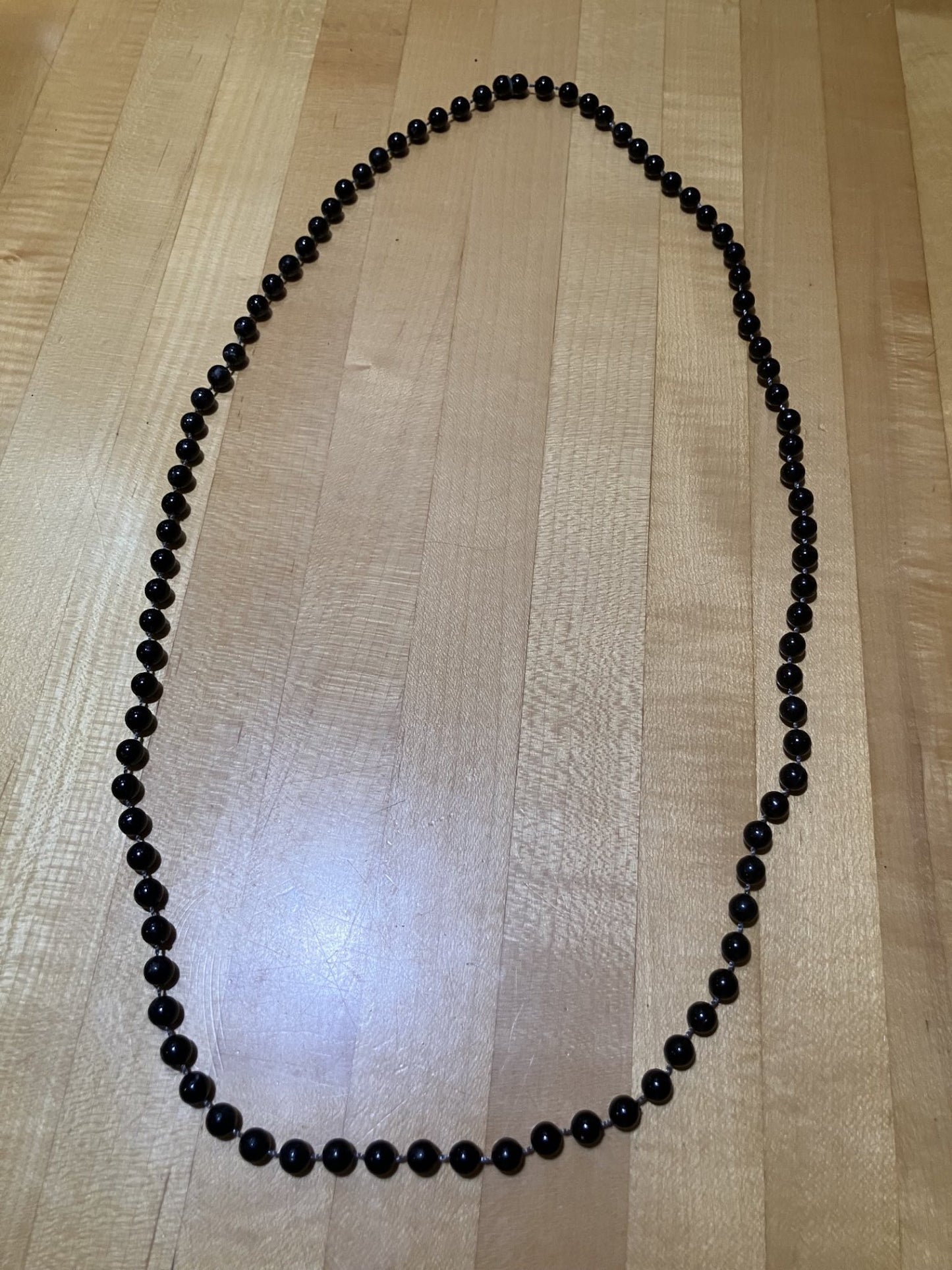 Snout link necklace and black bead necklace