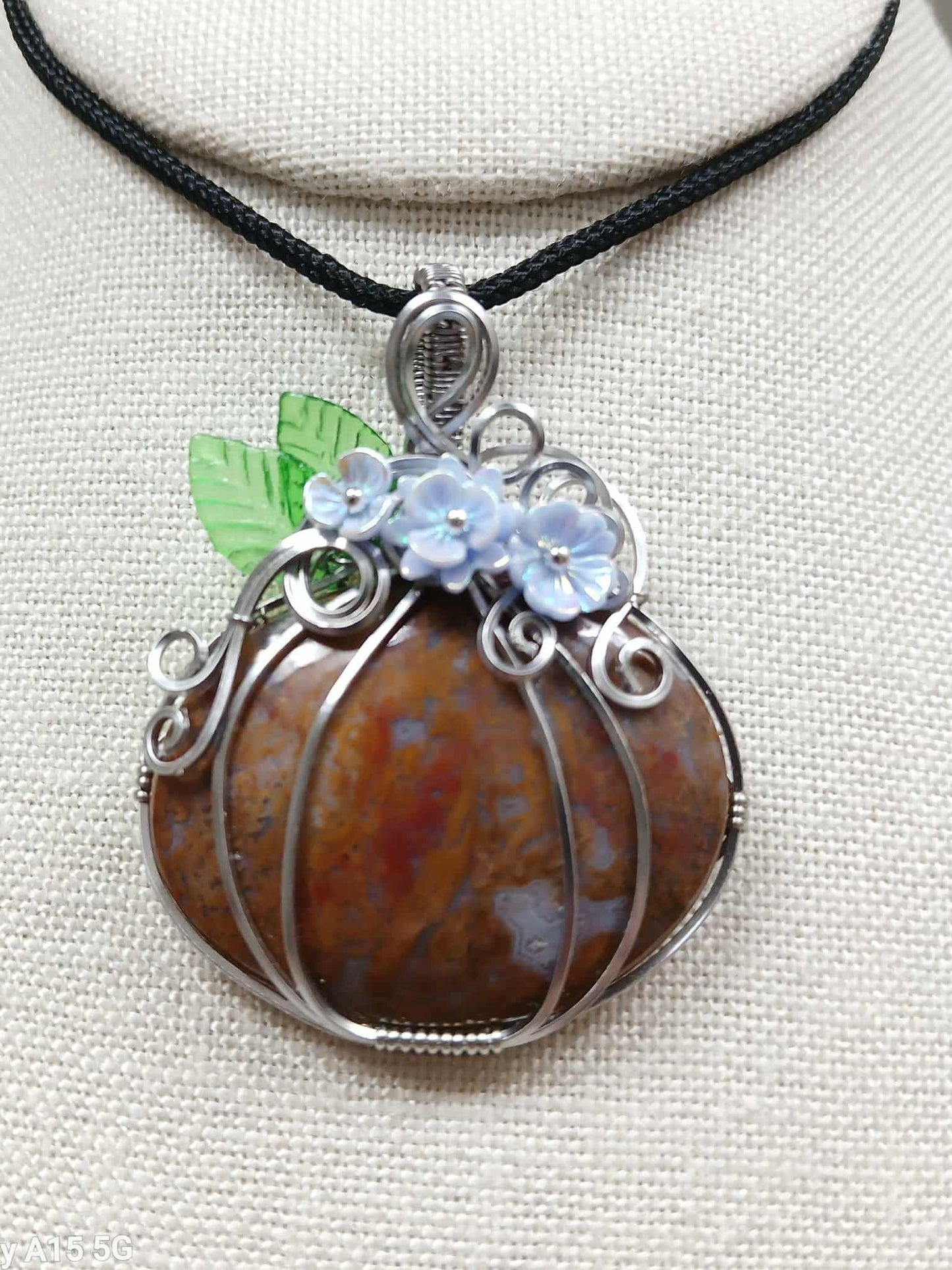 Fall necklace with wire wrap pumpkin (agate) and sweet flower accents.