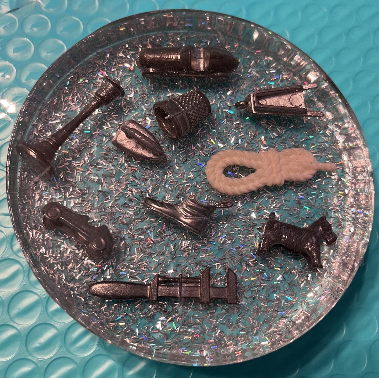 Resin coaster or paperweight made from vintage game pieces