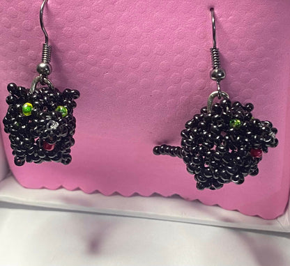 Black beaded pig earrings