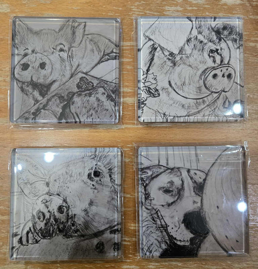 Set of 4 coasters featuring our favorite pigs and one energetic dog.