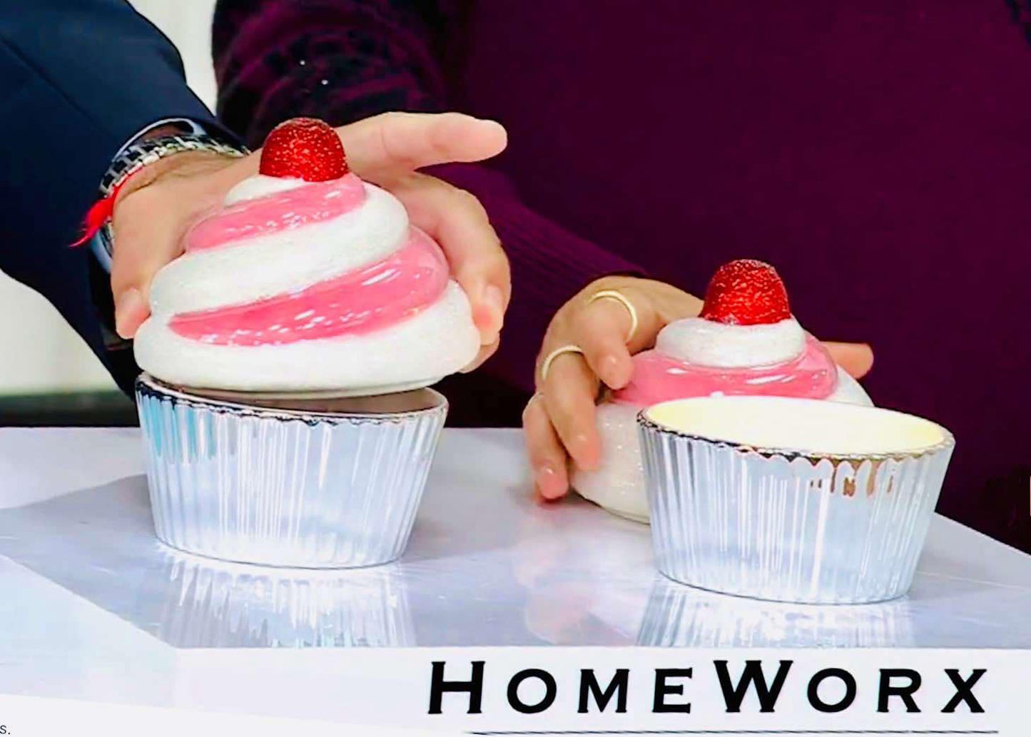 Two ceramic cupcake candles from HomeWorx by Slatkin + Co.