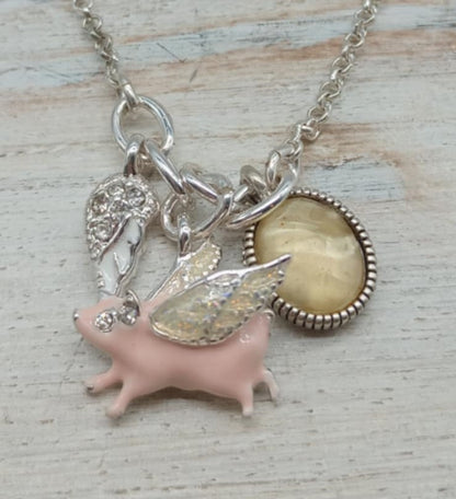 Flying pig necklace and earrings