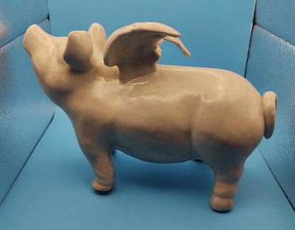 Winged ceramic pig