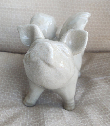 Winged ceramic pig