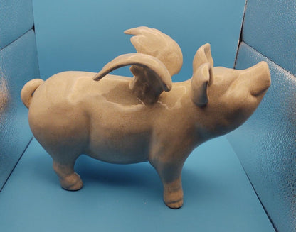 Winged ceramic pig