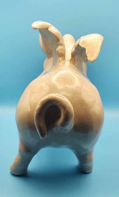 Winged ceramic pig