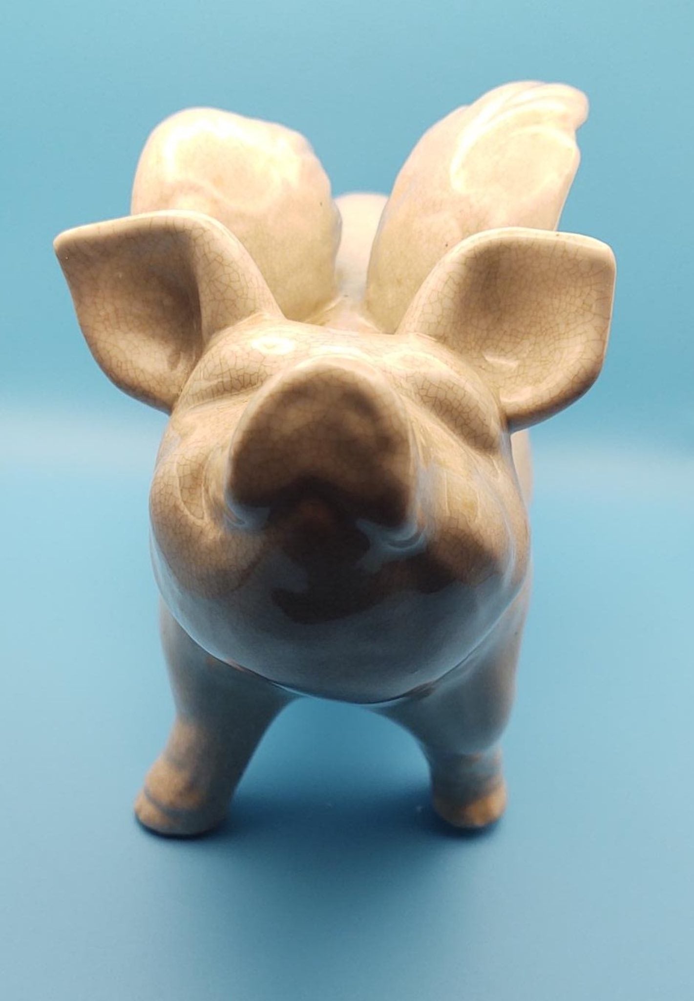 Winged ceramic pig